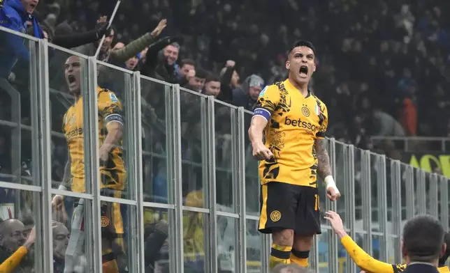 Inter Milan's Lautaro Martinez celebrates after scoring his side's opening goal during a Serie A soccer match between Inter Milan and Genoa, at the San Siro stadium in Milan, Italy, Saturday, Feb. 22, 2025. (AP Photo/Luca Bruno)