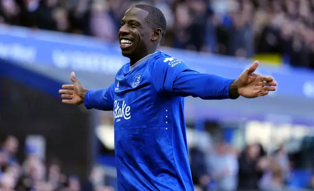 Everton's Abdoulaye Doucoure celebrates scoring during the English Premier League soccer match between Everton and Leicester City at Goodison Park, Liverpool, England, Saturday Feb. 1, 2025. (Peter Byrne/PA via AP)