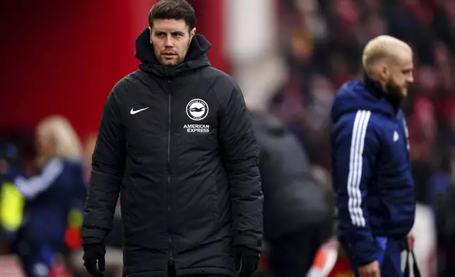Brighton and Hove Albion manager Fabian Hurzeler looks on during the Premier League match between Brighton and Nottingham Forest at the City Ground, Nottingham, England, Saturday Feb. 1, 2025. (Martin Rickett/PA via AP)