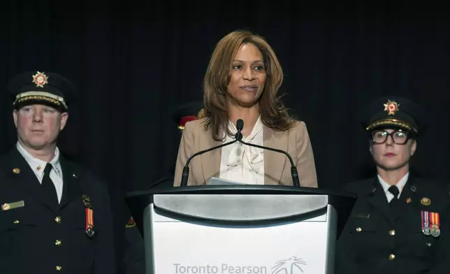 Deborah Flint, CEO of Greater Toronto Airports Authority, speaks to the media at Toronto Pearson Airport, Tuesday Feb. 18, 2025. (Chris Young/The Canadian Press via AP)