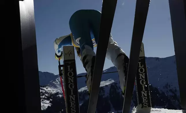 United States' Lindsey Vonn starts an alpine ski, women's World Championship downhill training, in Saalbach-Hinterglemm, Austria, Tuesday, Feb. 4, 2025. (AP Photo/Gabriele Facciotti)