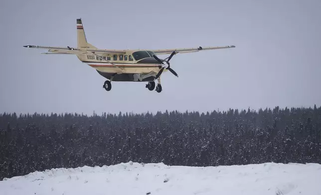 A Bering Air plane prepares to arrive in Ambler on Saturday, April 9, 2022. (Emily Mesner/Anchorage Daily News via AP)