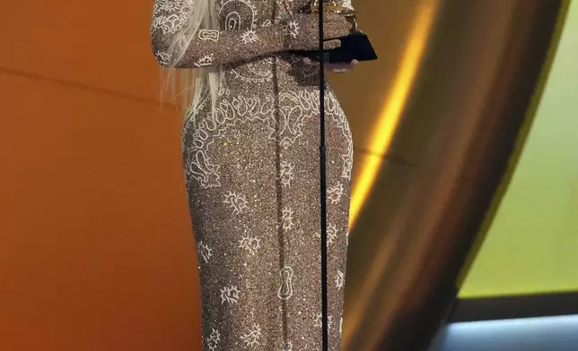 Beyonce accepts the award for best country album for "COWBOY CARTER" during the 67th annual Grammy Awards on Sunday, Feb. 2, 2025, in Los Angeles. (AP Photo/Chris Pizzello)