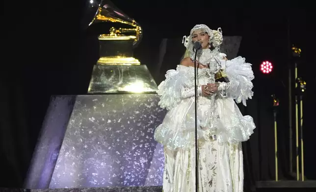 Sierra Ferrell accepts the award for best americana performance for "American Dreaming" during the 67th annual Grammy Awards on Sunday, Feb. 2, 2025, in Los Angeles. (AP Photo/Chris Pizzello)