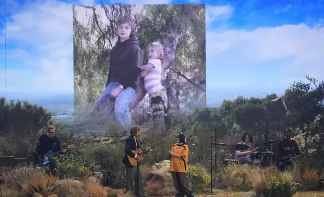 Finneas O'Connell, left, and Billie Eilish perform "Birds of a Feather" during the 67th annual Grammy Awards on Sunday, Feb. 2, 2025, in Los Angeles. (AP Photo/Chris Pizzello)