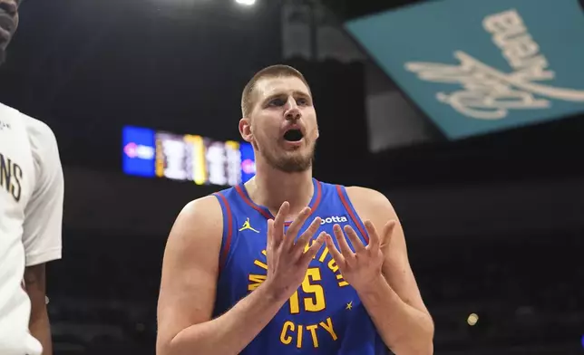 Denver Nuggets center Nikola Jokic argues for a call in the first half of an NBA basketball game against the New Orleans Pelicans, Monday, Feb. 3, 2025, in Denver. (AP Photo/David Zalubowski)