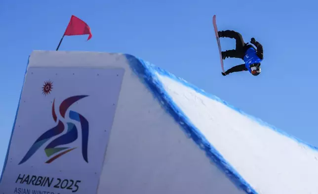 Liu Haoyu of China competes in the Men's Snowboard Big Air at the 9th Asian Winter Games in Yabuli in northeast China's Heilongjiang province on Monday, Feb. 10, 2025. (AP Photo/Andy Wong)