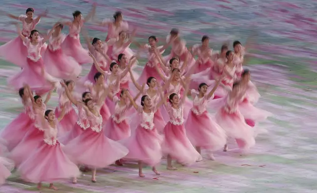 Artists perform during the closing ceremony of the Asian Games in Harbin, China, Friday, Feb. 14, 2025. (Hannah Mckay, Pool Photo via AP)