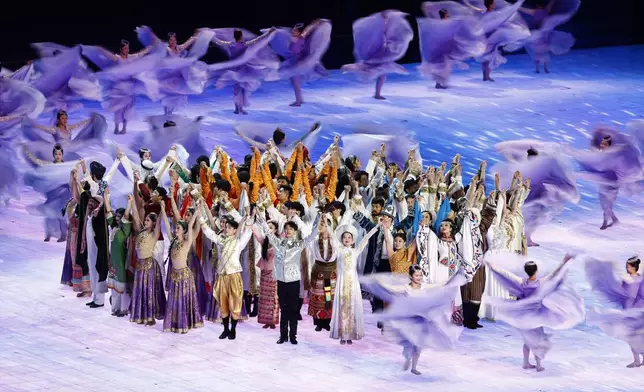 Performers dance during the opening ceremony of the 9th Asian Winter Games in Harbin, China, Friday, Feb. 7, 2025. (Issei Kato/Pool Photo via AP)