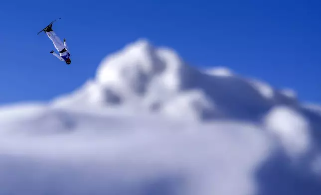 Li Xinpeng of China competes in the Men's Freeski Aerials at the 9th Asian Winter Games in Yabuli in northeast China's Heilongjiang province on Sunday, Feb. 9, 2025. (AP Photo/Andy Wong)