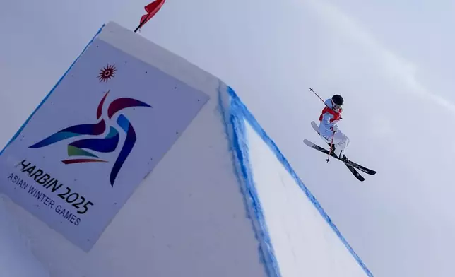 Yang Ruyi of China competes in the Women's Freeski Big Air Final at the 9th Asian Winter Games in Yabuli in northeast China's Heilongjiang province on Wednesday, Feb. 12, 2025. (AP Photo/Andy Wong)