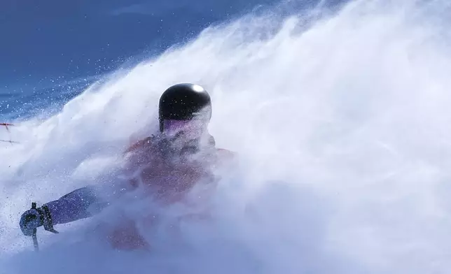 Han Linshan of China lands her jump during the Women's Freeski Big Air Final at the 9th Asian Winter Games in Yabuli in northeast China's Heilongjiang province on Wednesday, Feb. 12, 2025. (AP Photo/Andy Wong)
