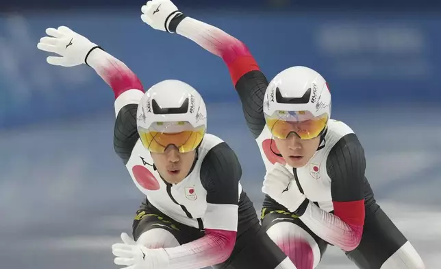 Japan team competes during the men's team sprint at the Speed Skating during the 9th Asian Winter Games in Harbin, China on Monday Feb. 10, 2025. (AP Photo/Aaron Favila)