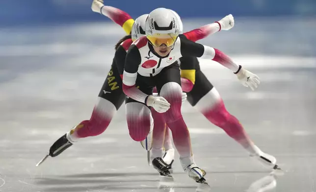 Team Japan competes during the women's team pursuit speed skating final at the 9th Asian Winter Games in Harbin, China on Tuesday, Feb. 11, 2025. (AP Photo/Aaron Favila)
