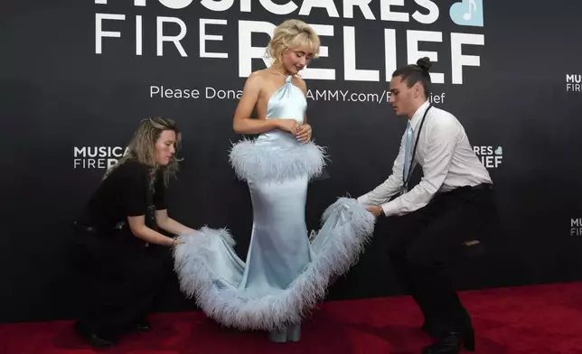 Sabrina Carpenter arrives at the 67th annual Grammy Awards on Sunday, Feb. 2, 2025, in Los Angeles. (Photo by Jordan Strauss/Invision/AP)