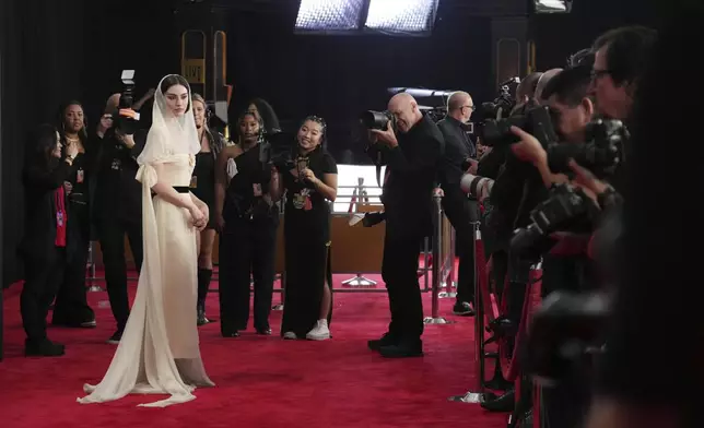 Gracie Abrams arrives at the 67th annual Grammy Awards on Sunday, Feb. 2, 2025, in Los Angeles. (Photo by Jordan Strauss/Invision/AP)