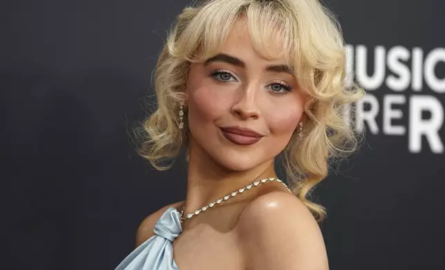 Sabrina Carpenter arrives at the 67th annual Grammy Awards on Sunday, Feb. 2, 2025, in Los Angeles. (Photo by Jordan Strauss/Invision/AP)