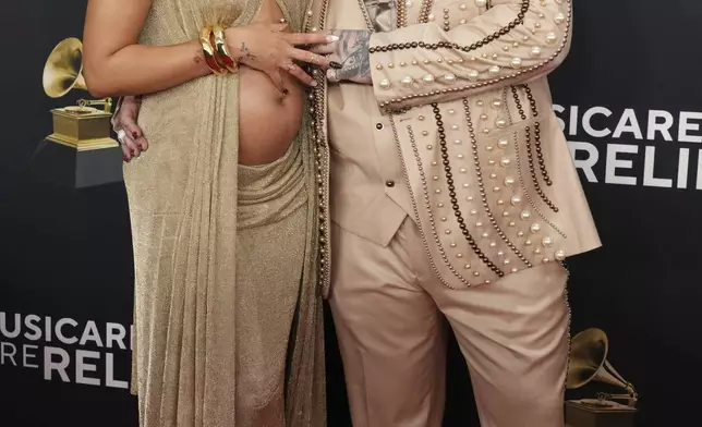 Raiche Wright, left, and Teddy Swims arrive at the 67th annual Grammy Awards on Sunday, Feb. 2, 2025, in Los Angeles. (Photo by Jordan Strauss/Invision/AP)