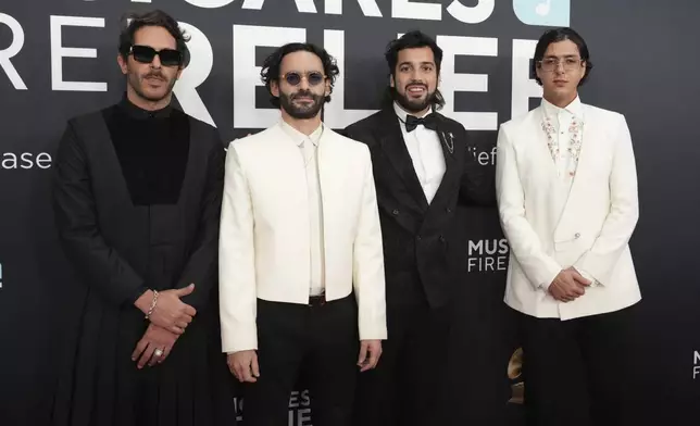 Alejandro Abeijon, from left, Andres Story, Antonio Casas and Alberto Montenegro of Rawayana arrive at the 67th annual Grammy Awards on Sunday, Feb. 2, 2025, in Los Angeles. (Photo by Jordan Strauss/Invision/AP)