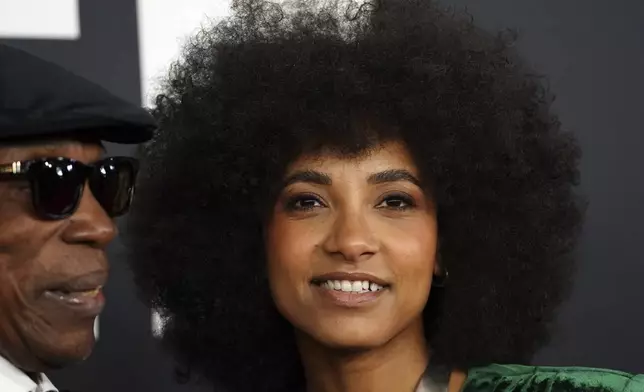 Milton Nascimento, left, and Esperanza Spalding arrive at the 67th annual Grammy Awards on Sunday, Feb. 2, 2025, in Los Angeles. (Photo by Jordan Strauss/Invision/AP)
