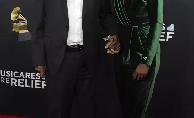 Milton Nascimento, left, and Esperanza Spalding arrive at the 67th annual Grammy Awards on Sunday, Feb. 2, 2025, in Los Angeles. (Photo by Jordan Strauss/Invision/AP)