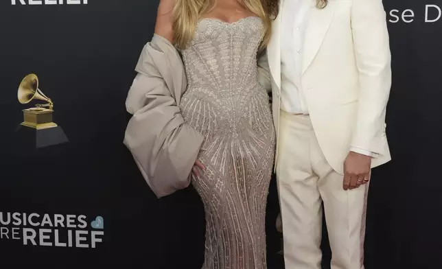 Heidi Klum, left, and Tom Kaulitz arrive at the 67th annual Grammy Awards on Sunday, Feb. 2, 2025, in Los Angeles. (Photo by Jordan Strauss/Invision/AP)