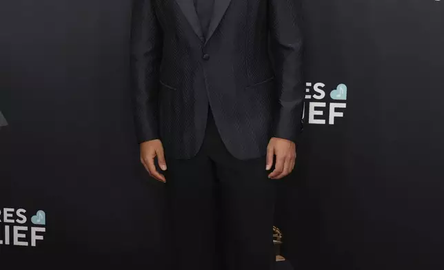 Trevor Noah arrives at the 67th annual Grammy Awards on Sunday, Feb. 2, 2025, in Los Angeles. (Photo by Jordan Strauss/Invision/AP)