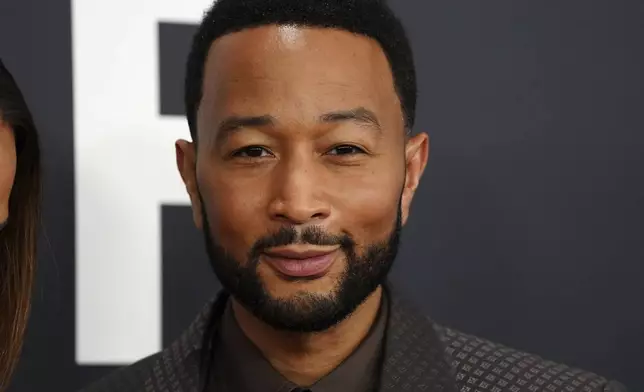 John Legend arrives at the 67th annual Grammy Awards on Sunday, Feb. 2, 2025, in Los Angeles. (Photo by Jordan Strauss/Invision/AP)