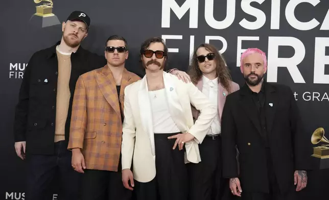 Kenny Beats, from left, Jon Beavis, Lee Kiernan, Mark Bowen, and Joe Talbot arrive at the 67th annual Grammy Awards on Sunday, Feb. 2, 2025, in Los Angeles. (Photo by Jordan Strauss/Invision/AP)