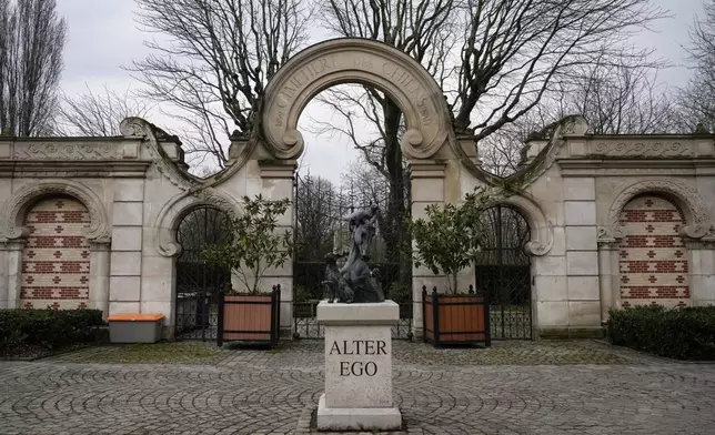 Outside view of the entrance of the pet cemetery of Asnieres-sur-Seine, west of Paris, Friday, Feb. 21, 2025. (AP Photo/Michel Euler)