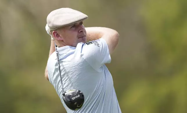 Harry Hall, of England, watches his tee shot on the second hole during the second round of the Mexico Open golf tournament in Puerto Vallarta, Mexico, Friday, Feb. 21, 2025. (AP Photo/Fernando Llano)