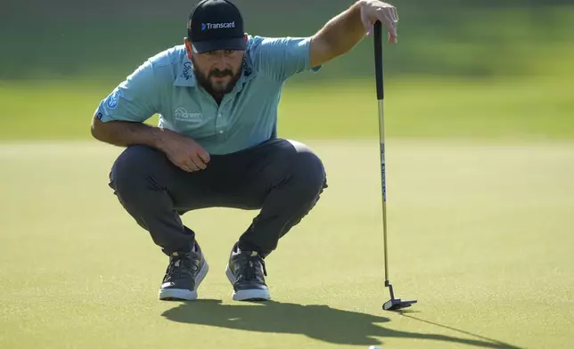 Stephan Jaeger, of Germany, lines up his putt on the green of the 15th hole during the second round of the Mexico Open golf tournament in Puerto Vallarta, Mexico, Friday, Feb. 21, 2025. (AP Photo/Fernando Llano)