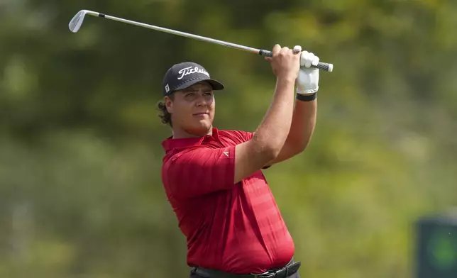 Aldrich Potgieter, of South Africa, watches his tee shot on the 13th hole during the second round of the Mexico Open golf tournament in Puerto Vallarta, Mexico, Friday, Feb. 21, 2025. (AP Photo/Fernando Llano)