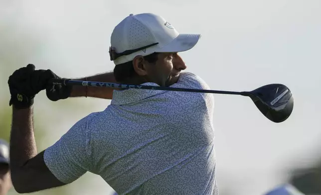 Aaron Rai, of England, watches his tee shot on the 14th hole during the second round of the Mexico Open golf tournament in Puerto Vallarta, Mexico, Friday, Feb. 21, 2025. (AP Photo/Fernando Llano)