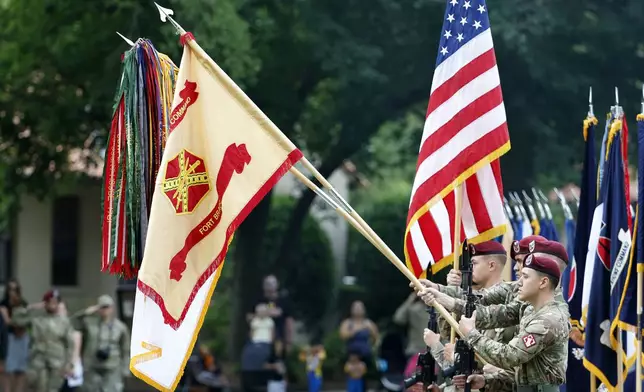 FILE - An honor guard displays the colors of Fort Bragg as a part of the ceremony to rename Fort Bragg, June 2, 2023 in Fort Liberty, N.C. (AP Photo/Karl B DeBlaker, File)