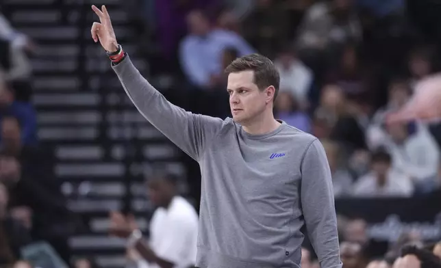 Utah Jazz head coach Will Hardy calls a play against the Los Angeles Lakers during the first half of an NBA basketball game, Wednesday, Feb. 12, 2025, in Salt Lake City. (AP Photo/Rob Gray)