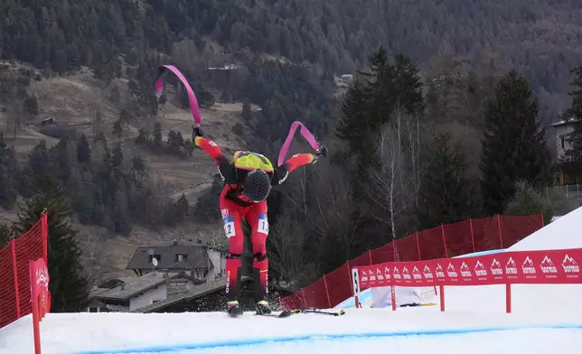 Spain's Oriol Cardona Coll competes during the men's mixed relay race at the Ski Mountaineering World Cup event in Bormio, Italy, Sunday, Feb. 23, 2025. (AP Photo/Antonio Calanni)
