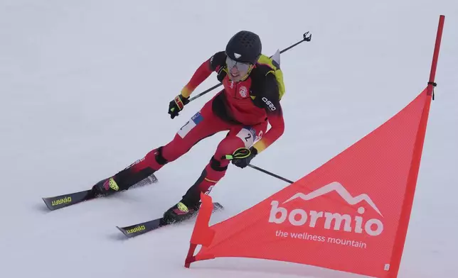 Spain's Oriol Cardona Coll competes during the men's sprint race at the Ski Mountaineering World Cup event in Bormio, Italy, Saturday, Feb. 22, 2025. (AP Photo/Antonio Calanni)