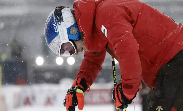Switzerland's Marco Odermatt concentrates ahead of a men's giant slalom, at the Alpine Ski World Championships, in Saalbach-Hinterglemm, Austria, Friday, Feb. 14, 2025. (AP Photo/Gabriele Facciotti)