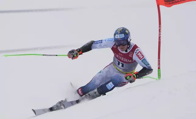 Norway's Timon Haugan competes in a men's giant slalom, at the Alpine Ski World Championships, in Saalbach-Hinterglemm, Austria, Friday, Feb. 14, 2025. (AP Photo/Giovanni Auletta)