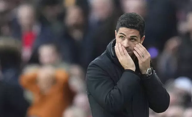Arsenal's manager Mikel Arteta reacts during the English Premier League soccer match between Arsenal and West Ham United at Emirates stadium in London, Saturday, Feb. 22, 2025. (AP Photo/Kirsty Wigglesworth)
