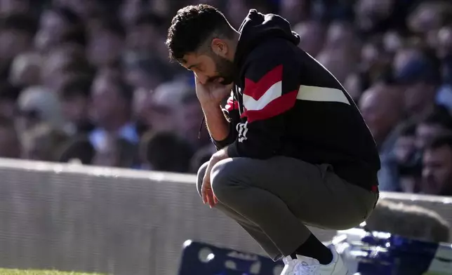 Manchester United manager Ruben Amorim gestures, during the English Premier League soccer match between Everton and Manchester United, at Goodison Park, in Liverpool, England, Saturday, Feb. 22, 2025. (Peter Byrne/PA via AP)