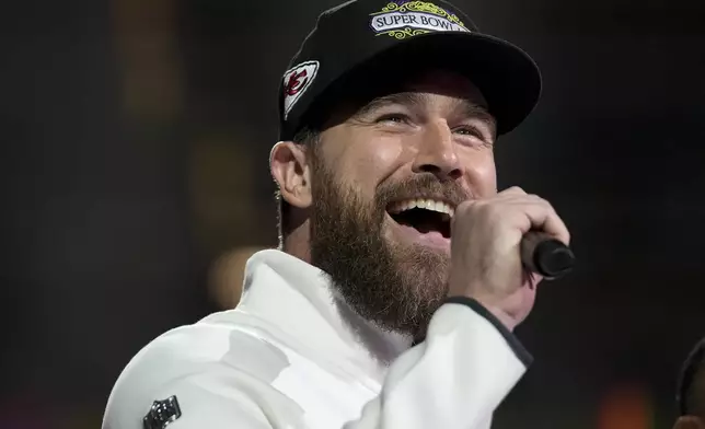 Kansas City Chiefs tight end Travis Kelce (87) participates during Super Bowl 59 Opening Night, Monday, Feb. 3, 2025, in New Orleans, ahead of the NFL football game between the Philadelphia Eagles and the Kansas City Chiefs Sunday. (AP Photo/Brynn Anderson )