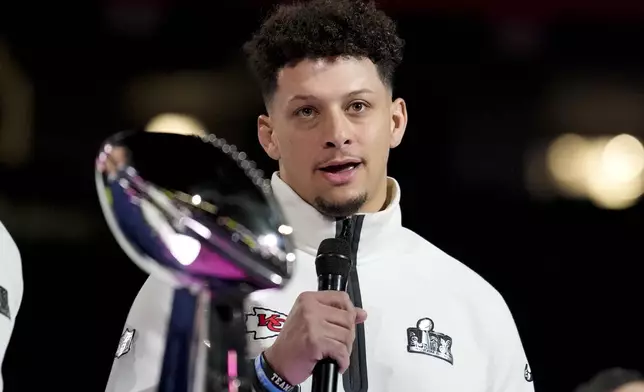 Kansas City Chiefs quarterback Patrick Mahomes (15) participates during Super Bowl 59 Opening Night, Monday, Feb. 3, 2025, in New Orleans, ahead of the NFL football game between the Philadelphia Eagles and the Kansas City Chiefs Sunday. (AP Photo/Brynn Anderson )