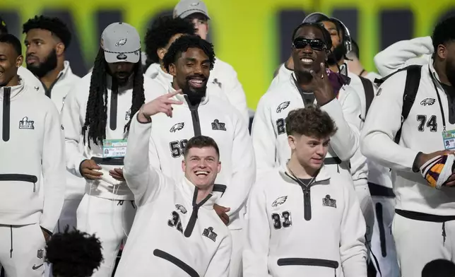 The Philadelphia Eagles arrive for Super Bowl 59 Opening Night, Monday, Feb. 3, 2025, in New Orleans, ahead of the NFL football game between the Philadelphia Eagles and the Kansas City Chiefs Sunday. (AP Photo/Matt York)