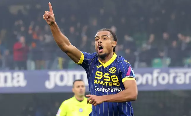 Hellas Verona's Antoine Bernede celebrates scoring during the Serie A soccer match between Hellas Verona and Fiorentina at the Marcantonio Bentegodi Stadium, Italy, Sunday Feb. 23, 2025. (Paola Garbuio/LaPresse via AP)