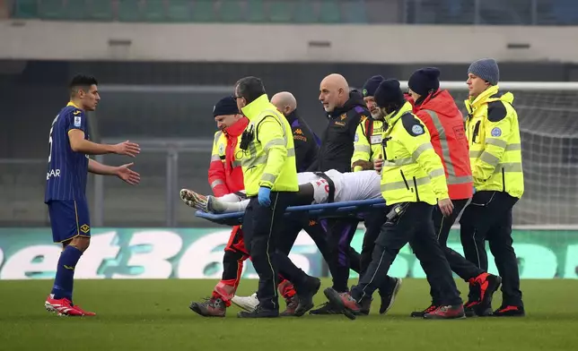 Fiorentina's Moise Kean is stretchered from the pitch during the Serie A soccer match between Hellas Verona and Fiorentina at the Marcantonio Bentegodi Stadium, Italy, Sunday Feb. 23, 2025. (Paola Garbuio/LaPresse via AP)