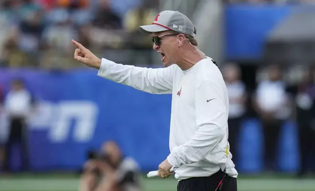 AFC coach Peyton Manning reacts during the flag football event at the NFL Pro Bowl, Sunday, Feb. 2, 2025, in Orlando. (AP Photo/Chris O'Meara)