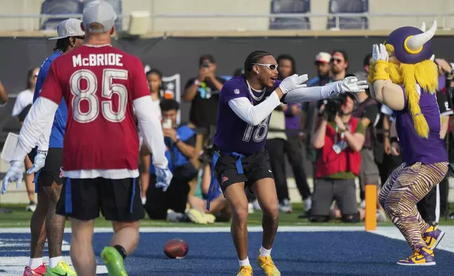 NFC wide receiver Justin Jefferson (18), of the Minnesota Vikings, celebrates after scoring a touchdown during the flag football event at the NFL Pro Bowl, Sunday, Feb. 2, 2025, in Orlando. (AP Photo/John Raoux)