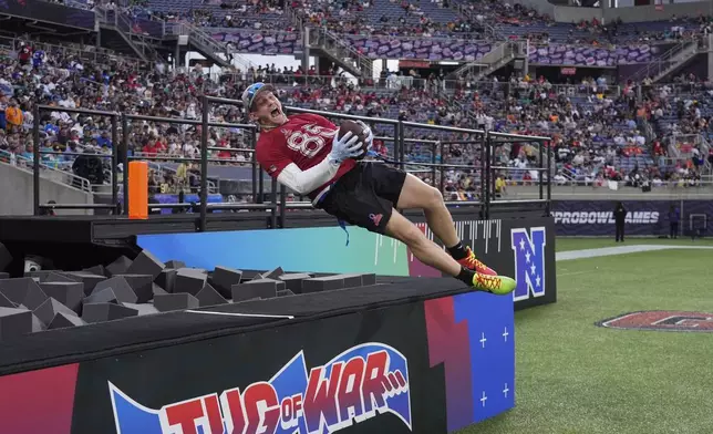 NFC tight end Trey McBride, of the Arizona Cardinals, celebrates after scoring a touchdown during the flag football event at the NFL Pro Bowl, Sunday, Feb. 2, 2025, in Orlando. (AP Photo/John Raoux)
